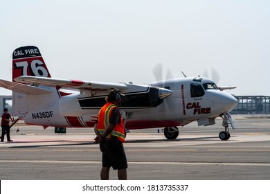 Fresno, California /USA  Sept ,09, 2020. Cal Fire S2 Aircraft Reloads Retardant For The Creek Fire  