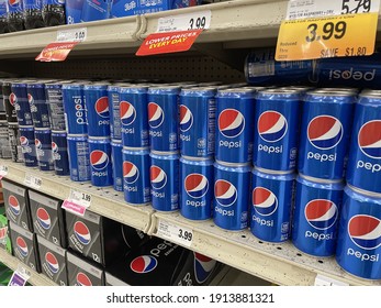 FRESNO, UNITED STATES - Feb 05, 2021: A Photo Of A Side Shot Of Small Pepsi Cans On Shelf