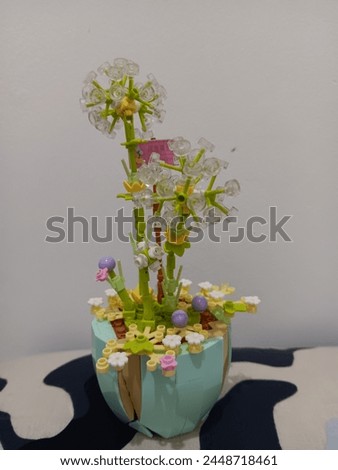 Friday, 12 Apr 2024 - Miniature flowers made from Lego, which are used as displays