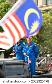 Friday, August 31, 2018. A Public Service Worker With His Friend Contributing On Malaysian Independence Day Parade Held In Putrajaya, Malaysia