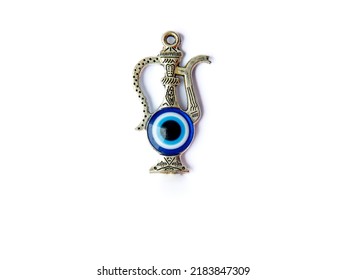 Fridge Magnet Souvenir In Shape Of Eastern Turkish Jug With Blue Evil Eye Nazar Boncuk Isolated On White Background. Travel To Turkey Tea Ceremony Concept. Top View Flat Lay Close Up, Copy Space