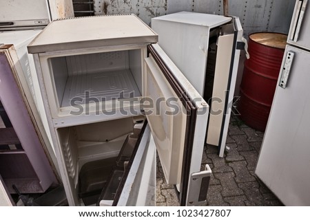 fridges dump, broken fridge containing cfc, danger to the ozone, hazardous waste
