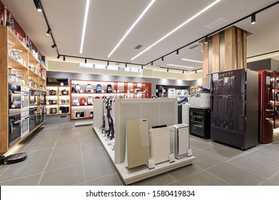 Fridges, heaters and and vacuum cleaners in the premium home appliance store - Shutterstock ID 1580419834