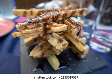 Fried Breaded Eggplant Tower With Honey. Front View