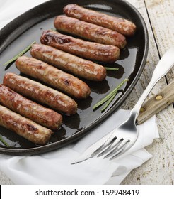 Fried Breakfast Sausage Links On A Pan