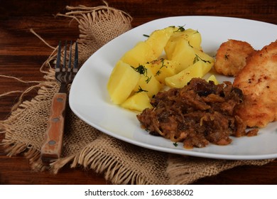 Fried Cabbage With Dried Mushrooms, Boiled Potatoes With Dill And Breaded Pork Tenderloin