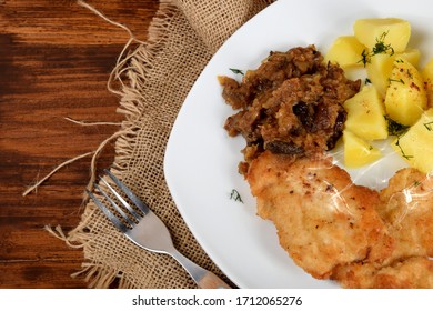 Fried Cabbage With Dried Mushrooms, Boiled Potatoes With Dill And Breaded Pork Tenderloin