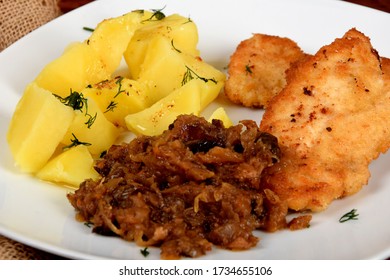 Fried Cabbage With Dried Mushrooms, Boiled Potatoes With Dill And Breaded Pork Tenderloin