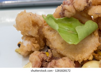 Fried Calamari And Baby Calamari Served With Lemon Garlic Mayonaise Sauce - Image