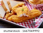 Fried catfish with cornbread dipped with buttermilk and seasoned with cornmeal, southern tradition