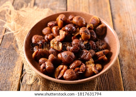 Similar – chestnut Eating