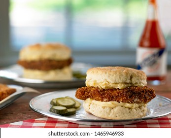 Fried Chicken And Biscuits Sandwich On Plate With Pickles
