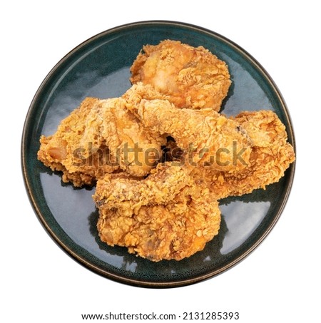 Fried chicken in black plate isolated on white background, Fried chicken on white With clipping path.