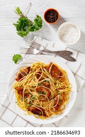 Fried  Chicken Breast Scampi With Gluten Free Pasta On White Plate With Forks On White Wooden Table, Vertical View From Above