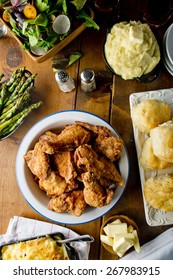 Fried Chicken. Chicken Dinner Served With Potatoes, Vegetables And Rolls. Chicken, Soaked In Buttermilk, Dredged In Flour, Spices And Fried In A Cast Iron Skillet. Classic American Southern Cuisine. 