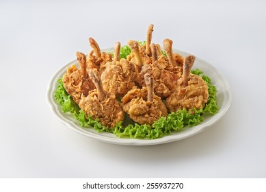 Fried Chicken Drum Stick In Plate Shoot On Clear Background