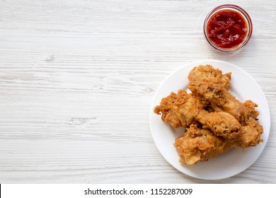 Fried Chicken Drumsticks On A White Round Plate With Ketchup, Overhead View. From Above, Flat-lay.