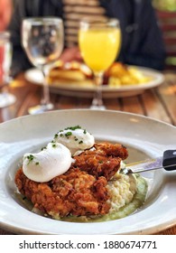 Fried Chicken, Eggs, And Jalapeno Grits Breakfast