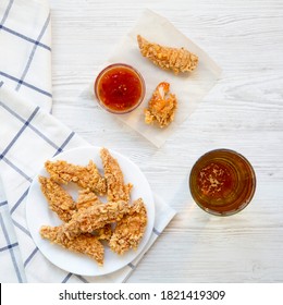 Fried Chicken Fingers Served With Cold Beer And Sauce, Overhead View. Top View, From Above.