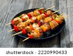 Fried chicken kebabs on plate