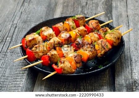 Fried chicken kebabs on plate