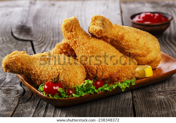fried chicken leg\
breaded