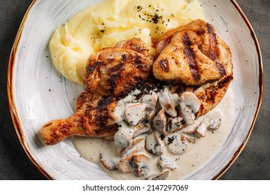 Fried Chicken With Mashed Potatoes And Mushrooms