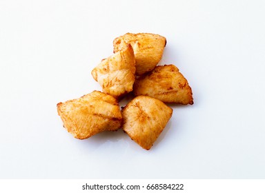 Fried chicken meat nuggets cubes isolated on white background with copy space