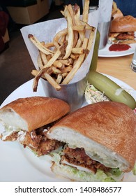 Fried Chicken Sandwhich In NYC, With Fries, Pickle And Slaw, Blur