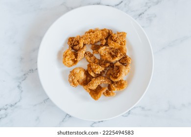 Fried Chicken Skin On Marble Blackground