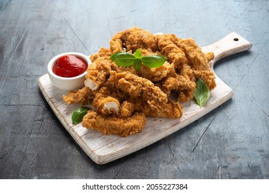 Fried Chicken Strips With Ketchup On White Wooden Board. Fast Food