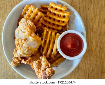 Fried Chicken And Waffle Fries With Ketchup