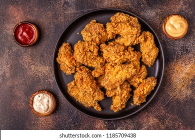 Fried Chicken Wings With Various Sauces, Top View.