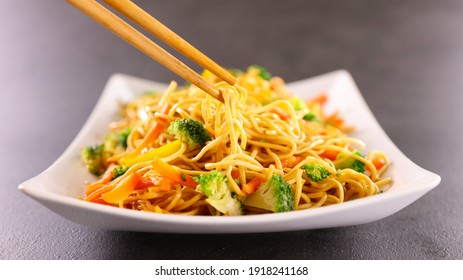 Fried Chinese Noodle And Chopsticks