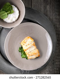 Fried Cod Fillets And Spinach