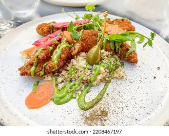 
Fried Cod Fish Fingers With Quinoa And Capari Dressing