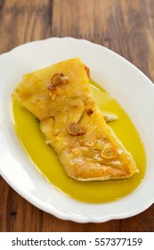 fried cod fish with garlic and olive oil