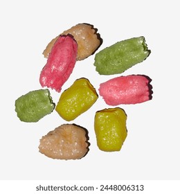 Fried colorful crunchy snack isolated on white background.
