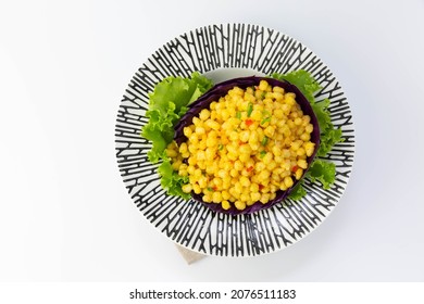 Fried Corn With Egg Yolk Sauce On White Background