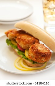 Fried Crab Cake Sandwich With Tomato And Lettuce