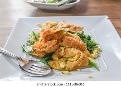 Fried Crispy Wonton And Kale Vegetable In Thai Restaurant