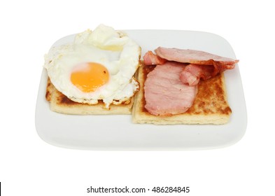 Fried Egg, Bacon And Irish Potato Bread On A Plate Isolated Against White