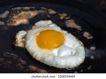 An Fried Egg In Butter In A Carbon Steel Frying Pan