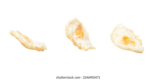 Fried Egg fly up from pan, fried egg float abstract and spin splash in air. Fried Egg is healthy ready food. White background Isolated high speed shutter, freeze stop motion photo