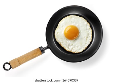 Fried Egg In Frying Pan Isolated