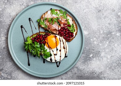 Fried Egg And Ham Sandwich On A Plate Top View