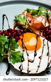 Fried Egg And Ham Sandwich On A Plate Top View Close-up