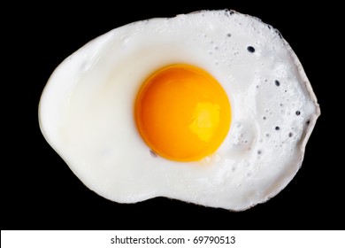 Fried Egg Isolated On Black Background