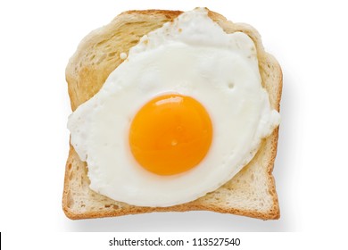 Fried Egg On White Toast From Above.