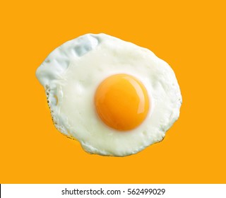 Fried Egg On Yellow Background, Top View